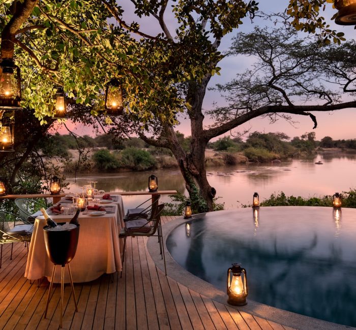 Tanzania-Grumeti-Serengeti-River-Lodge-Experiences-Guest-Delight-Pool-dinner_3